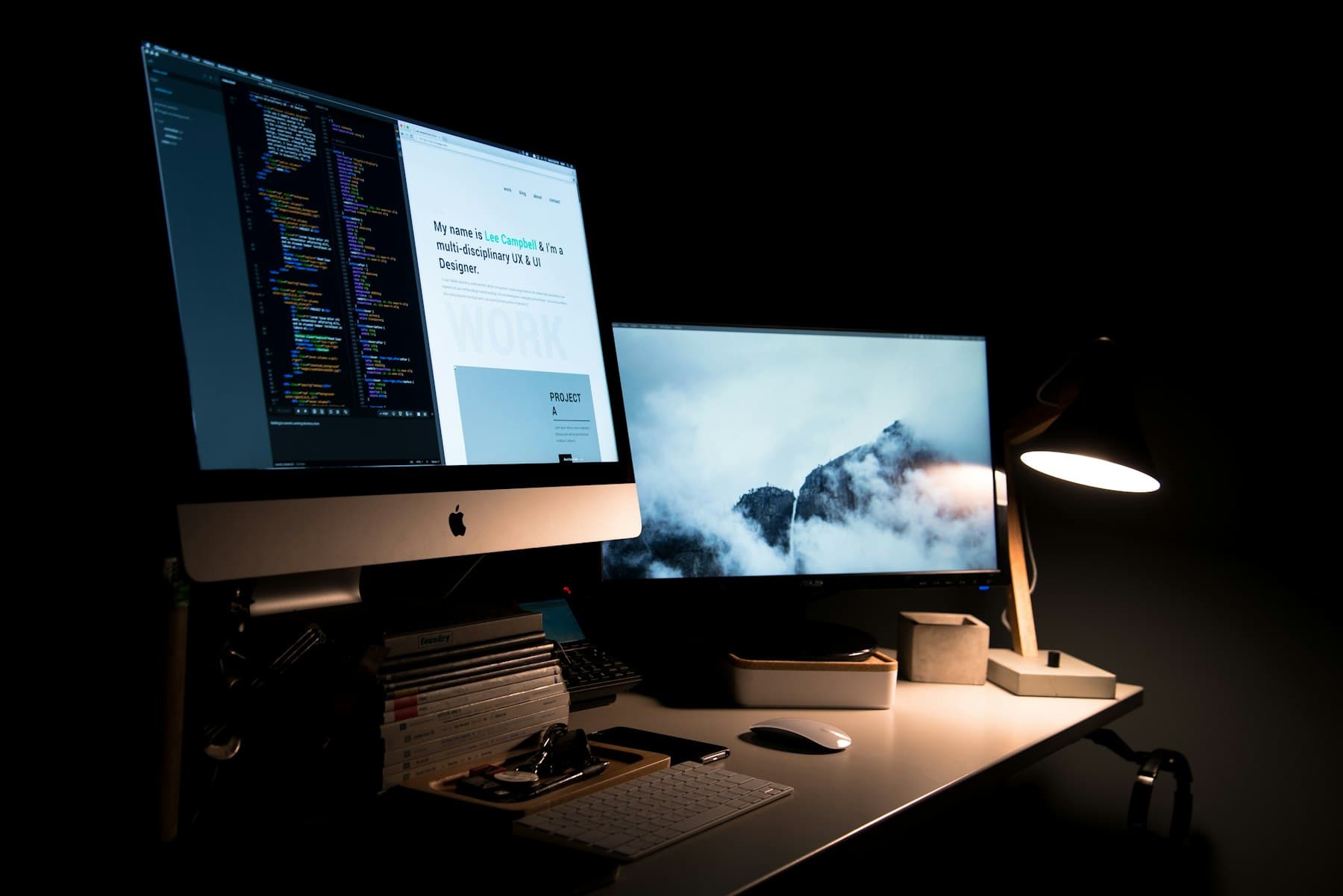 A desk with a website layout on screen, used as a sample project frame.